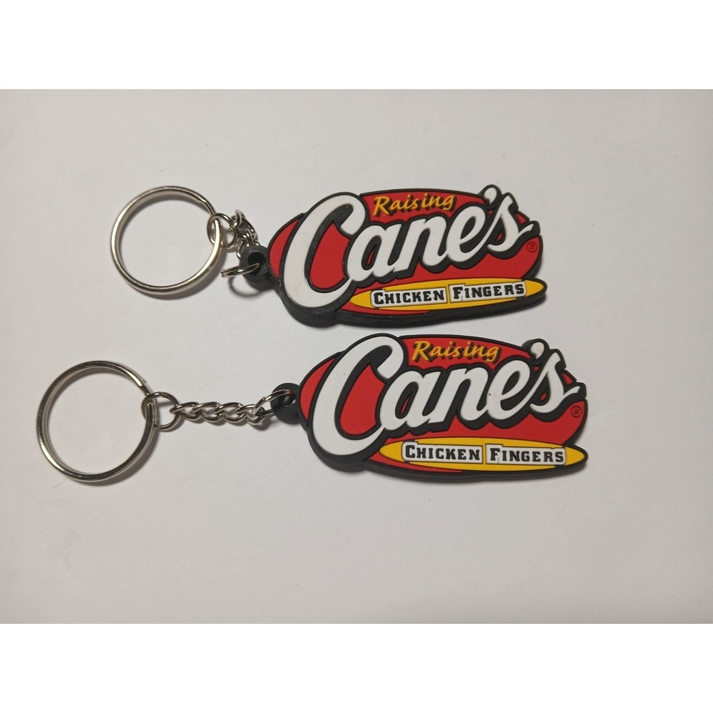 Two Raising Canes Chicken Fingers Rubber Keychain 2.5 Inches X 1 Inch